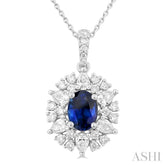 7x5 MM Oval Cut Sapphire and 3/4 ctw Pear & Round Cut Diamond Halo Precious Pendant With Chain in 14K White Gold